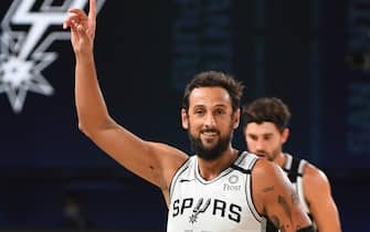 ORLANDO, FL - JULY 25: Marco Belinelli #18 of the San Antonio Spurs smiles and points during the game against the Brooklyn Nets on July 25, 2020 in Orlando, Florida at The Arena at ESPN Wide World of Sports. NOTE TO USER: User expressly acknowledges and agrees that, by downloading and/or using this photograph, user is consenting to the terms and conditions of the Getty Images License Agreement. Mandatory Copyright Notice: Copyright 2020 NBAE (Photo by Garrett Ellwood/NBAE via Getty Images)