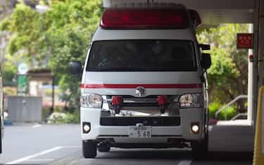 Ambulances outside the ER entrance at the National Center for Global Health and Medicine, Tokyo, Japan, during an outbreak of the COVID-19 coronavirus, April 24, 2020. Photographer credit Niclas Ericsson. (Photo by Smith Collection/Gado/Getty Images)