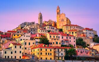 Dramatic sunset over medieval town Cervo on italian Riviera, Liguria, Italy