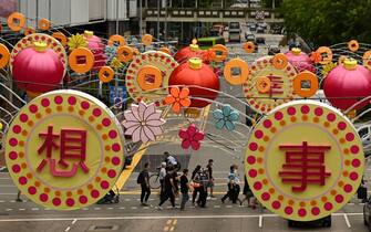 Colourful lanterns decorated above the street to mark the upcoming Lunar New Year in the Chinatown district of Singapore on January 4, 2023. (Photo by Roslan RAHMAN / AFP) (Photo by ROSLAN RAHMAN/AFP via Getty Images)