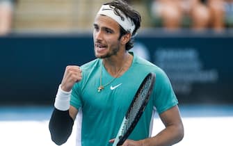 ADELAIDE, AUSTRALIA - JANUARY 11:  Lorenzo Musetti of Italy 
 celebrates winning the set in his match against Alexander Bublik of Kazakhstan during day four of the 2024 Adelaide International at Memorial Drive on January 11, 2024 in Adelaide, Australia. (Photo by Mark Brake/Getty Images)