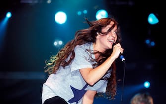 Alanis Morissette performs on stage at T In The Park Festival, Strathclyde Country Park, Lanarkshire, Scotland, United Kingdom, 13th July 1996. (Photo by Mick Hutson/Redferns)