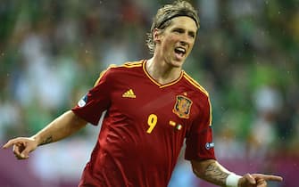 epa03265577 Spain's Fernando Torres celebrates after scoring the 3-0 lead during the Group C preliminary round match of the UEFA EURO 2012 between Spain and Ireland in Gdansk, Poland, 14 June 2012.  EPA/VASSIL DONEV UEFA Terms and Conditions apply http://www.epa.eu/downloads/UEFA-EURO2012-TCS.pdf