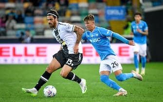Udinese's Joao Ferreira in action against Napoli's Jesper Lindstrom  during  Udinese Calcio vs SSC Napoli, Italian soccer Serie A match in Udine, Italy, May 06 2024