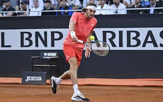 Stefanos Tsitsipas of Greece in action against Jan-Lennard Struff of Germany  (not pictured) during their men's singles match at the Italian Open tennis tournament in Rome, Italy, 11 May 2024. ANSA/ALESSANDRO DI MEO