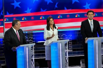 MIAMI, FL -NOVEMBER 8:  Former United Nations Ambassador Nikki Haley, center, answers a question as former New Jersey Gov. Chris Christie, left, and Florida Gov. Ron DeSantis look on during the Republican Presidential Debate at the Adrienne Arsht Center for the Performing Arts on November 8, 2023. (Photo by Jonathan Newton/The Washington Post via Getty Images)