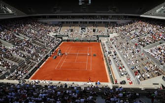epa09257529 General view of the Philippe-Chatrier court during the quarter final match between Rafael Nadal of Spain and Diego Schwartzman of Argentina at the French Open tennis tournament at Roland Garros in Paris, France, 09 June 2021.  EPA/IAN LANGSDON