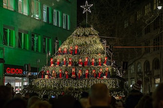 Singing christmas tree during christmas time, WerdmÃ¼hleplatz, ZÃ¼rich, Switzerland.