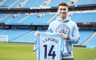 MANCHESTER, ENGLAND - JANUARY 30:  (EDITORS NOTE: Image was altered with digital filters.)  (EXCLUSIVE COVERAGE) New signing Aymeric Laporte takes part in his first photo shoot at Manchester City Football Club at Etihad Stadium on January 30, 2018 in Manchester, England.  (Photo by Victoria Haydn/Manchester City FC via Getty Images)