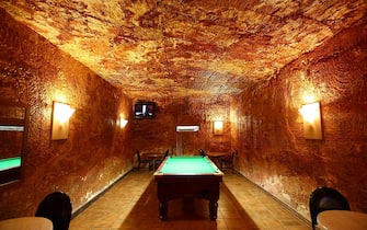 COOBER PEDY, AUSTRALIA - OCTOBER 22:  The pool room in the underground bar in the Desert Cave Hotel is seen on October 22, 2015 in Coober Pedy, Australia.  (Photo by Mark Kolbe/Getty Images)