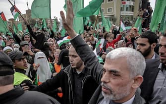 epa09065848 (FILE) - Hamas Gaza leader Yahya Al Sinwar (C) waves to supporters during a Hamas rally to mark the 31st anniversary of the group, in Gaza City, Gaza Strip, 16 December 2018 (reissued 10 March 2021). Sinwar was re-elected as Gaza Hamas leader on 10 March 2021.  EPA/MOHAMMED SABER *** Local Caption *** 54846862