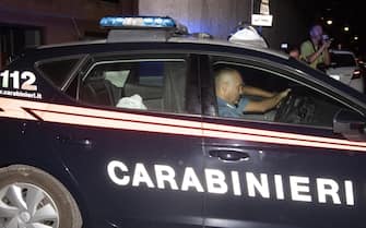 A Carabinieri car with an unusual mass of cloth on the back seat leaves a Carabinieri police station, in Rome, Italy, early Saturday morning, 27 July 2019. A young American tourist has confessed to stabbing to death Mario Cerciello Rega, a Carabiniere police officer who was investigating the theft of a bag and cellphone before dawn on Friday. ANSA/CLAUDIO PERI - GIUSEPPE LAMI 