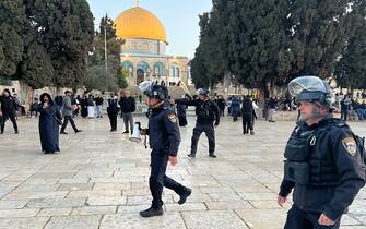Israeli police walk inside the Al-Aqsa mosque compound in Jerusalem, early on April 5, 2023 after clashes erupted during Islam's holy month of Ramadan. - Israeli police said they had entered to dislodge "agitators", a move denounced as an "unprecedented crime" by the Palestinian Islamist movement Hamas. The holy Muslim site is built on top of what Jews call the Temple Mount, Judaism's holiest site. (Photo by AHMAD GHARABLI / AFP) (Photo by AHMAD GHARABLI/AFP via Getty Images)