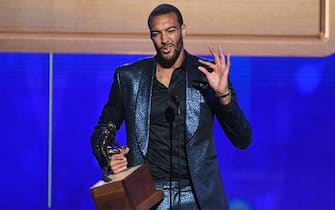 SANTA MONICA, CALIFORNIA - JUNE 24: Rudy Gobert accepts the Kia NBA Defensive Player of the Year award onstage during the 2019 NBA Awards presented by Kia on TNT at Barker Hangar on June 24, 2019 in Santa Monica, California. (Photo by Kevin Winter/Getty Images for Turner Sports)