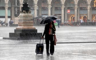 Pioggia forte in centro a Milano, 6 luglio 2023.ANSA/MOURAD BALTI TOUATI

