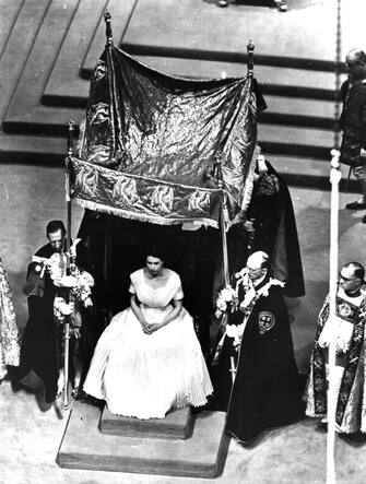 2nd June 1953:  The canopy is placed over the Queen for the anointing ceremony during her coronation.  (Photo by Keystone/Getty Images)