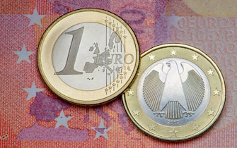 German Euro coin on a 10 Euro note