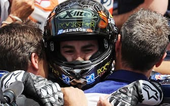 Spanish Moto GP rider Jorge Lorenzo of Yamaha Factory Racing, celebrates his victory after the Moto GP race of the Italian motorcycling Grand Prix at Mugello circuit, central Italy, 15 July 2012. ANSA/ CARLO FERRARO