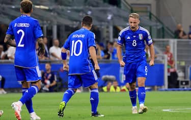 MILAN, ITALY - SEPTEMBER 12: Davide Frattesi (R) of Italy celebrates after scoring the opening goal during the UEFA EURO 2024 European qualifier match between Italy and Ukraine at Stadio San Siro on September 12, 2023 in Milan, Italy. (Photo by Giuseppe Cottini/Getty Images)