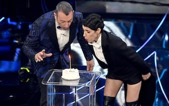 Sanremo Festival host and artistic director Amadeus (L) and Italian singer Giorgia on stage at the Ariston theatre during the 74th Sanremo Italian Song Festival in Sanremo, Italy, 07 February 2024. The music festival runs from 06 to 10 February 2024.   ANSA/RICCARDO ANTIMIANI