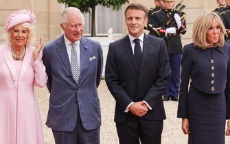 epa10871705 Britain's King Charles III (2-L), Queen Camilla (L), French President Emmanuel Macron (2-R) and First Lady Brigitte Macron (R) pose together at the Elysee Palace in Paris, France, 20 September 2023. The visit, initially planned for March and postponed because of unrests in France, leads the king and queen of Great Britain to Paris and Bordeaux and includes a state dinner, official appointments with President Macron and more informal meetings with French and British citizens.  EPA/TERESA SUAREZ