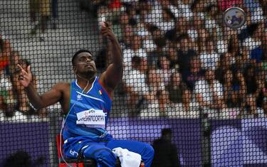 Medaglia d'oro per l'Italia nel lancio del disco F52 alle Paralimpiadi di Parigi: lo ha conquistato Rigivan Ganeshamoorthy che ha stabilito anche il record del mondo con la misura di 27.06, Parigi, 01 settembre 2024.
ANSA / CIP - Eva Pavia +++ HANDOUT PHOTO - NO SALES - EDITORIAL USE ONLY - NPK+++