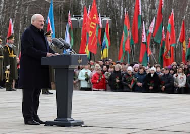 epa10536830 A handout photo made available by the Belarus Presidential Press Service shows Belarusian President Alexander Lukashenko delivering a speech during a ceremony to mark the 80th anniversary of the Khatyn Massacre, at the Eternal Flame at the Khatyn Memorial Complex in Khatyn, Belarus, 22 March 2023. On 22 March 1943, in retaliation for an attack by Soviet partisans, Nazi Germany s troops gathered 149 Khatyn residents, including 75 children, into a barn and set it on fire before proceeding to destroy the whole village and shooting those who managed to escape the fire.  EPA/BELARUS PRESIDENT PRESS SERVICE /HANDOUT  HANDOUT EDITORIAL USE ONLY/NO SALES