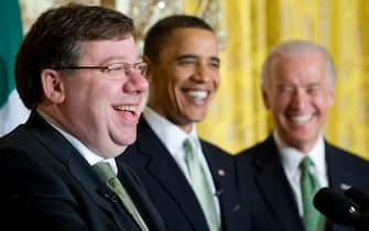 Prime Minister Brian Cowen of Ireland speaks alongside US President Barack Obama (C) and US Vice President Joe Biden (R) during a St. Patrick's Day reception in the East Room of the White House in Washington, DC, March 17, 2010. AFP PHOTO / Saul LOEB (Photo credit should read SAUL LOEB/AFP via Getty Images)