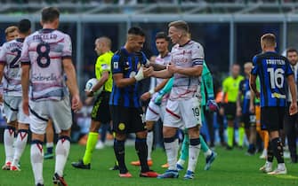 Lautaro Martinez of FC Internazionale and Lewis Ferguson of Bologna FC seen at the end of the match during Serie A 2023/24 football match between FC Internazionale and Bologna FC at Giuseppe Meazza Stadium, Milan, Italy on October 07, 2023