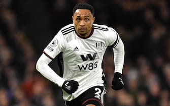 epa10402338 Kenny Tete of Fulham in action during the English Premier League soccer match between Fulham FC and Chelsea FC in London, Britain, 12 January 2023.  EPA/Vince Mignott EDITORIAL USE ONLY. No use with unauthorized audio, video, data, fixture lists, club/league logos or 'live' services. Online in-match use limited to 120 images, no video emulation. No use in betting, games or single club/league/player publications