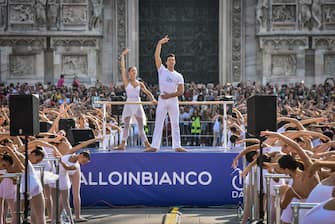 Italian dancer Roberto Bolle, Étoile of the Teatro alla Scala, and the prima ballerina of La Scala, Nicoletta Manni dance during the On Dance event in Piazza Duomo, in Milan, Italy, 10 September 2023.  2300 dance school students arrived from all over Italy to participate in the second edition of 'On dance', days dedicated to dance conceived and promoted by Roberto Bolle.