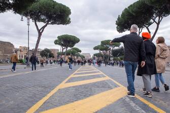 ROME, ITALY - 2023/11/19: People walk in Via dei Fori Imperiali during the first ecological Sunday of autumn 2023 decided by the Municipality of Rome. On the occasion of the World Remembrance Day for Road Traffic Victims, activists and associations created an installation in Via dei Fori Imperiali in Rome to remember the deaths due to road accidents, to ask for greater road safety for pedestrians, cyclists and motorists. (Photo by Matteo Nardone/Pacific Press/LightRocket via Getty Images)