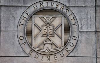 On the wall at the entrance to St Leonard's Land in Holyrood Road, the coat of arm of the University of Edinburgh.