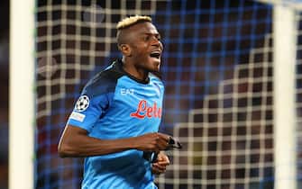 15 March 2023, Italy, Neapel: Soccer: Champions League, SSC Napoli - Eintracht Frankfurt, knockout round, round of 16, second leg, Stadio Diego Armando Maradona. Napoli's Victor Osimhen celebrates after his goal for 1:0. Photo: Oliver Weiken/dpa