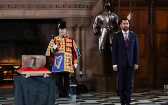 ATTENTION EDITORS - PICTURE EMBARGOED TO 0600 GMT FRIDAY APRIL 28, 2023  Scotland's First Minister Humza Yousaf stands beside the Stone of Destiny in Edinburgh Castle before onward transportation to Westminster Abbey for the Coronation of King Charles III, in Edinburgh, Scotland, Britain April 27, 2023. REUTERS/Russell Cheyne/Pool
