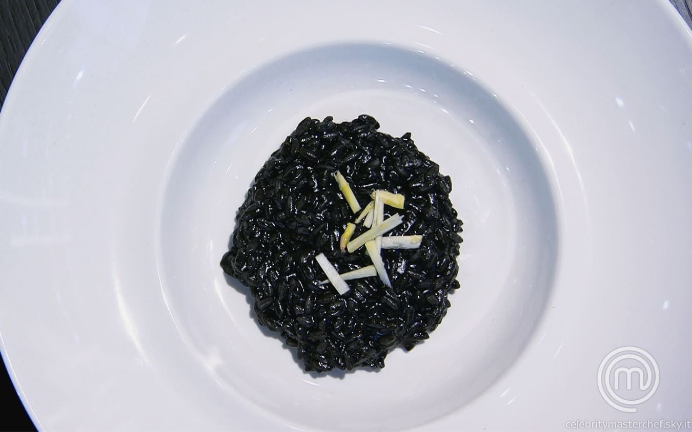 Risotto al nero di seppia e pecorino con sorpresa