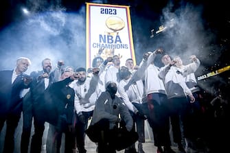 DENVER, CO - OCTOBER 24: Members of the 2022-23 NBA Champion Denver Nuggets pose with their rings and banner before the first quarter against the Los Angeles Lakers at Ball Arena in Denver on Tuesday, October 24, 2023. (Photo by AAron Ontiveroz/The Denver Post)