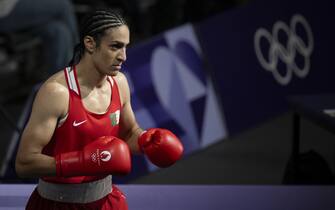 Algeria's Imane Khelif (in red) during their women's 66kg preliminaries round of 16 boxing match during the Paris 2024 Olympic Games at the North Paris Arena, in Villepinte on August 1, 2024. Female boxer yells 'this is unjust' and falls to her knees in tears as she quits fight against 'biologically male' Olympic opponent Imane Khelif after just 46 seconds following two powerful punches. Photo by Eliot Blondet/ABACAPRESS.COM