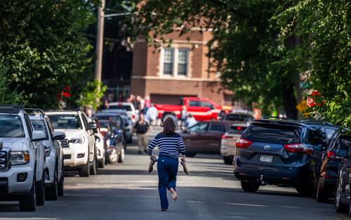 A parent runs toward the school during an active shooter situation at the Annunciation Church in Minneapolis, Minn., on Wednesday, Aug. 27, 2025.] RICHARD TSONG-TAATARII • richard.tsong-taatarii @startribune.com