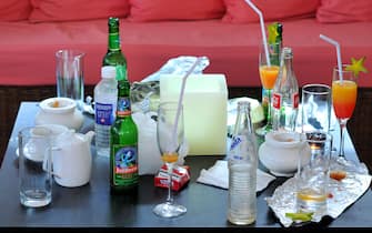 Empty drinks bottles and glasses