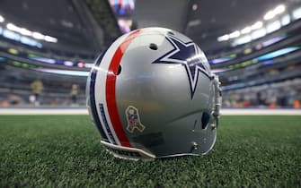 ARLINGTON, TEXAS - NOVEMBER 07: A view of the Dallas Cowboys helmet featuring a red and blue stripe to honor our countryâ€™s armed forces and Medal of Honor recipients at the Salute to Service game as the Cowboys host the Denver Broncos at AT&T Stadium on November 07, 2021 in Arlington, Texas. (Photo by Tom Pennington/Getty Images)