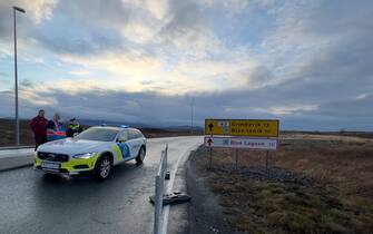 GRINDAVIK, ICELAND - NOVEMBER 12: The road to Grindavik is closed by the police on November 12, 2023 in Grindavik, Iceland. The country has declared a state of emergency after a series of earthquakes around the Fagradalsfjall volcano in recent weeks, prompting worries of a potential eruption. (Photo by Micah Garen/Getty Images)