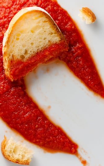 Scarpetta - an Italian Habit, Cleaning a Dish from Tomato Sauce Using Bread