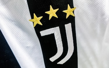 Juventus Football Club logo is seen on a football jersey in a store in Krakow, Poland on December 15, 2021 (Photo by Jakub Porzycki/NurPhoto via Getty Images)
