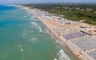 Aerial view of Tirrenia - Marina di Pisa sea coast beach during the fly with helicopter HH412C, Volpe 220, of the Aerial Section of the Italian Finance guard (Guardia di Finanza) as patrol areas and seacoast over Tuscany region against illegal activity and crowd of people during the country's emergency period aimed at contains the spread of the Covid-19 coronavirus, Pisa, Italy, 15 August 2020. ANSA/FABIO MUZZI