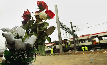 MADRID, SPAIN - MARCH 12:  Flowers are seen left as a tribute to those who died in the terrorist bombings on three trains at Atocha train station on March 12, 2004 in Madrid, Spain.  According to judicial sources 198 people were killed in the series of blasts.   (Photo by Bruno Vincent/Getty Images)