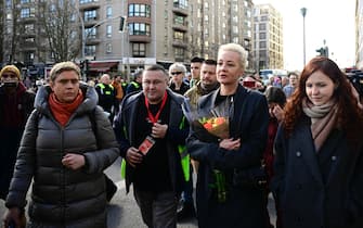 Yulia Navalnaya (2R), widow of the late Kremlin opposition leader Alexei Navalny, arrives for a rally near the Russian embassy in Berlin, where voters lined up to cast their ballots in the Russia's presidential election on March 17, 2024. (Photo by Tobias SCHWARZ / AFP)