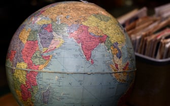 SANTA FE, NEW MEXICO - DECEMBER 9, 2019:  A vintage globe of the world for sale in an antique shop showing the Indian Ocean and surrounding countries including India, the eastern coast of Africa and countries in the Middle East including Saudi Arabia. (Photo by Robert Alexander/Getty Images)