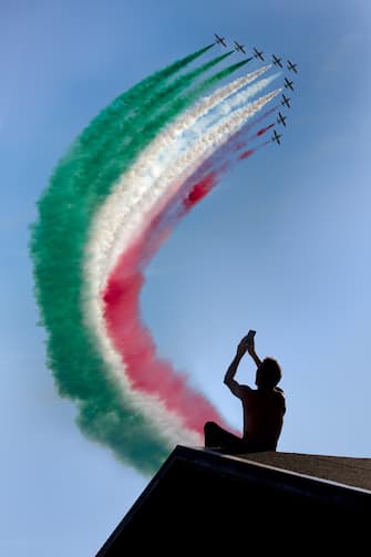 The Frecce Tricolore, the Three-Colored Arrows, fly all over Italy for celebrations, this one to celebrate the summer on the beach of Ladispoli.