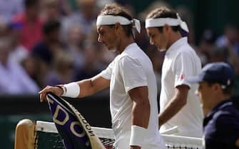 epa07712867 Roger Federer of Switzerland (R) and Rafael Nadal of Spain during their semi final match during the Wimbledon Championships at the All England Lawn Tennis Club, in London, Britain, 12 July 2019. EPA/NIC BOTHMA EDITORIAL USE ONLY/NO COMMERCIAL SALES